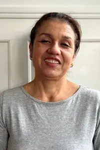 Porträt von Maria Claudia, Reinigungskraft in der Kita Bärlis